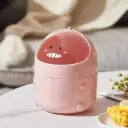 Tacho con forma de dinosaurio 