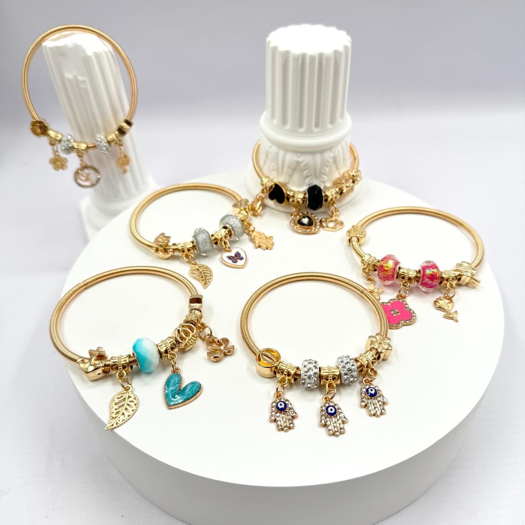 PULSERA DORADA CON DIJES X1U.